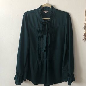 Bowtie teal silky blouse.
